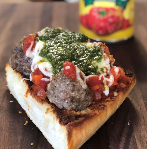 Wagyu Meatball Sub on Roasted Garlic Bread with Cashew Pesto