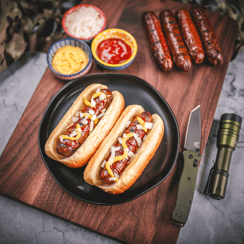 Wagyu Hot Dogs on cutting board grilled to perfection from KC Cattle Company